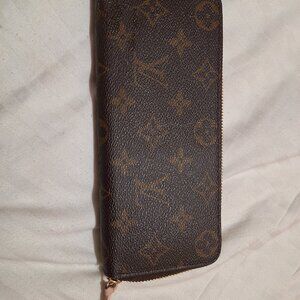 Rose pink authentic Louis Vuitton Clemence wallet